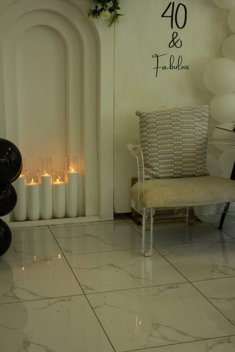 Floor sand candles in displayed for a 40th birthday party.